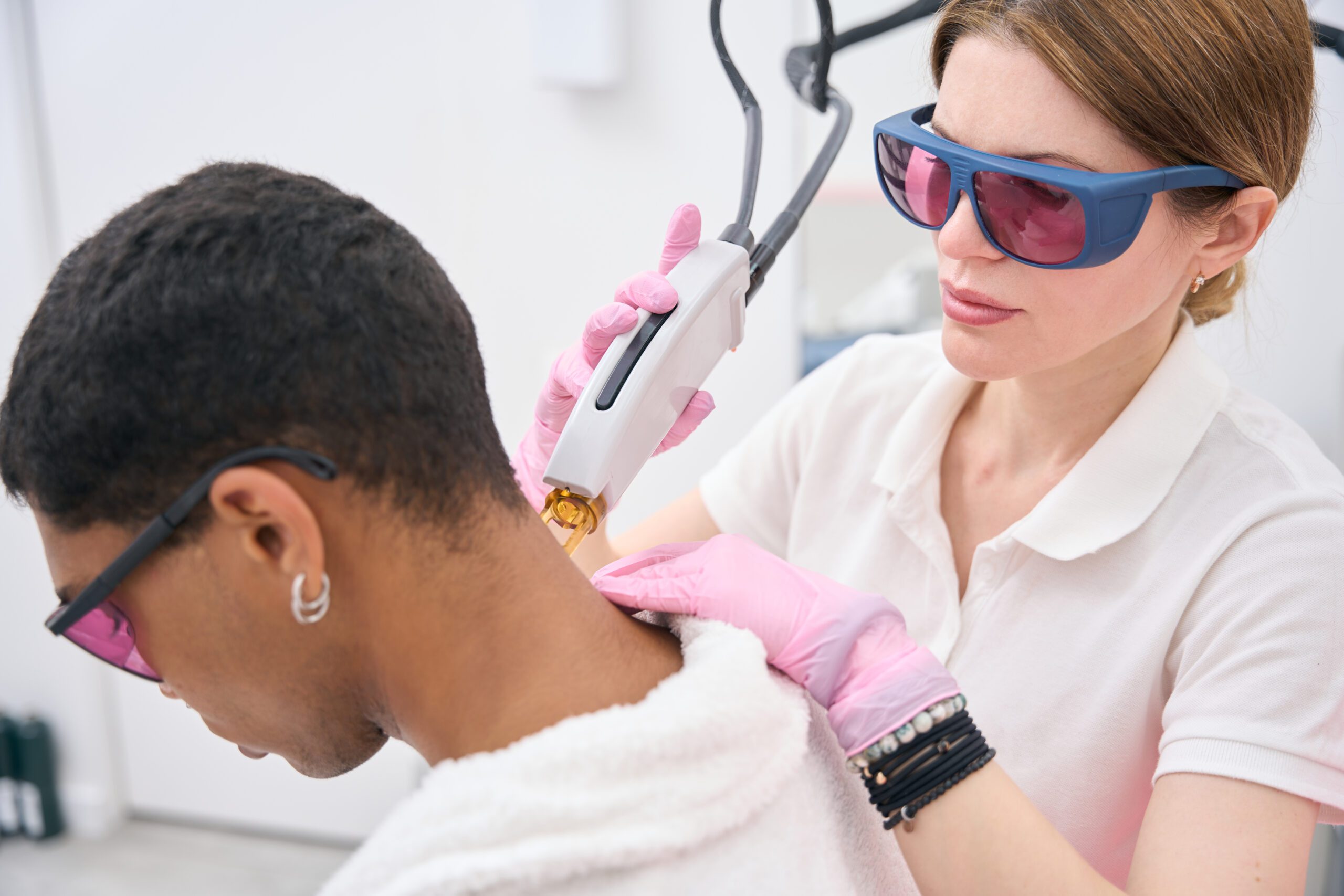 cosmetician conducting hair removal procedure on m 2023 11 27 05 18 32 utc scaled